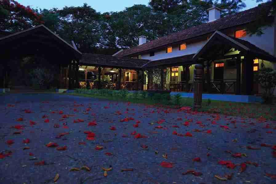 KABINI RIVER LODGE NESTLED ON THE SOUTHERN FRINGES OF NAGARHOLE NATIONAL PARK, THE COLONIAL-STYLE LODGES IN THE LUSH GREEN SURROUNDINGS GIVE