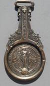 Category: 1915 San Francisco's Panama-Pacific International Exposition (97 to 104) Lot # 97 - Fob in the shape of a small frying pan. On the handle is "Official Souvenir".