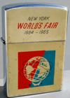 The set includes a hand mirror, hair brush and a comb. Across the top is "Official Souvenir New York World's Fair" and the Unisphere is pictured on the card, the brush and the mirror.