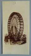 Lot # 18 - Celluloid card with black image of "The Ferris Wheel - World's Fair 1893" with "250 Feet Diameter" written below. This has a hole at top probably for hanging on the wall.