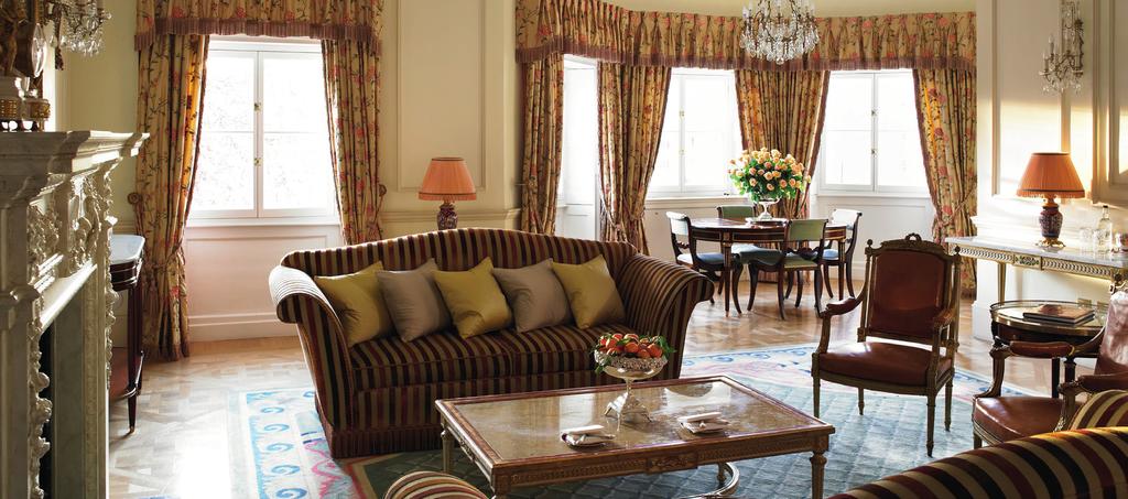 THE PRINCE OF WALES SUITE Signature Suite Apartment style accommodation including a hallway, cloakroom, guest bathroom, dining room, kitchen and two bedrooms, with views overlooking the Royal Green