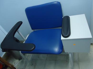 Item B-2.15 Chairs, blood taking, high Set of a chair and a table for blood sample taking. 1) Wide blood donor chair which provide a comfortable patient position.