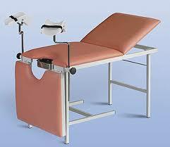 Item B-2.29 Tables, Gynaecologic Examination/Treatment Table/Bed for general gynecological examination with lithotomy poles. 1) Chromium-plated steel legs and epoxy-coated stainless steel structure.