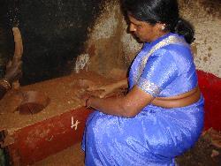 Smokeless household stoves & Women. More than 12000 sarala stove built by successful stove Entrepreneur Mrs. Kathyayini over a 11 years. 10 villages converted into smokeless villages.