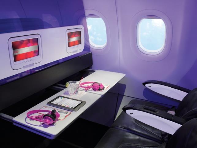 cabin Dedicated flight attendant and lavatory for 8 seats Free movies + premium TV Free live television In-seat power Extra