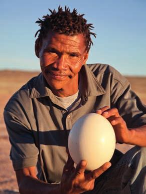left: Guide Pieter Jacobs at!xaus Lodge, with an ostrich egg found on the pan near the lodge.