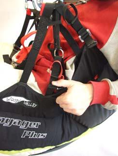 Pull the handle outwards in order to extract the reserve parachute from the harness container.