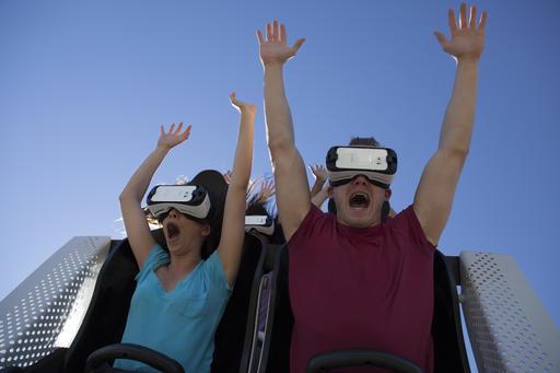 Best new theme park rides: Virtual reality, interactivity 26 May 2016, by Terrance Harris wearing the virtual reality headsets.