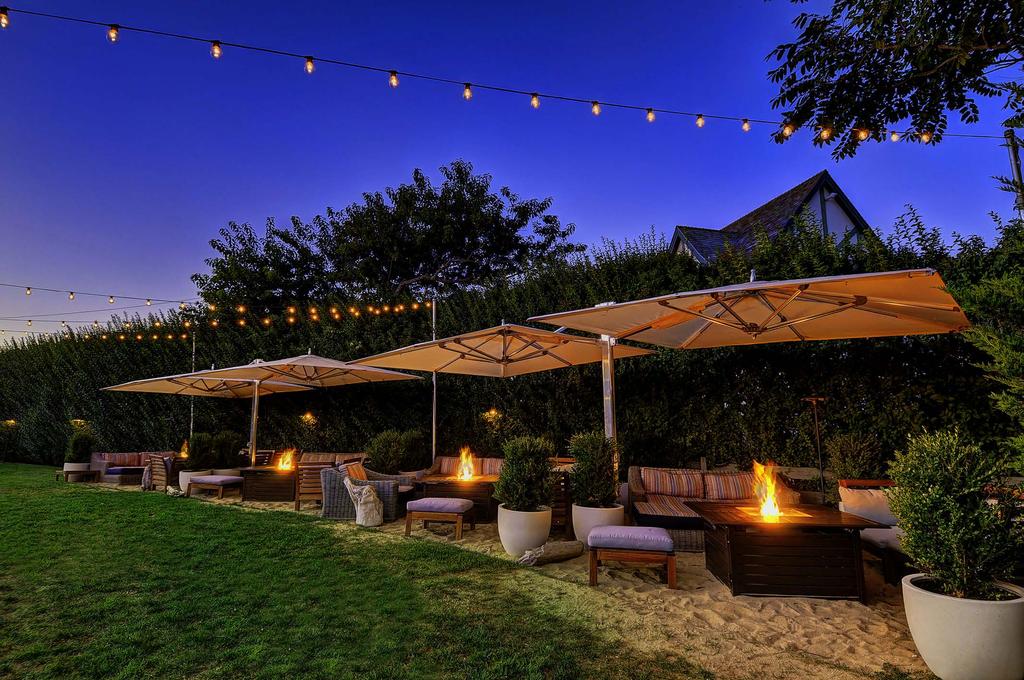 THE LAWN AREA: ENDLESS POSSIBILITIES. Featuring cabanas and fire pits, our lawn is available for seated dinners, cocktail receptions, and events of all kinds.