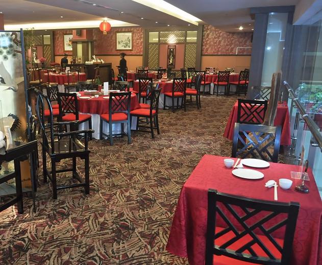 The main dining room offer elegant contemporary Chinese design with collection of both modern and antique artwork and artifact.