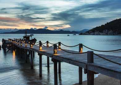 from different wine regions around the world with a panoramic view of Ninh Van Bay.