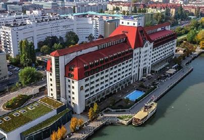 Travel & Accommodation 15) Hilton Danube Waterfront**** 16) Hotel Astoria Austria Trend**** Along e Danube River, is conference hotel is located wiin a 10-minute walk from e metro station "Stadion".