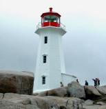 Peggy of the Cove was the title given to the sole survivor of a shipwreck on Halibut Rock, Nova Scotia, near the famous fishing village where a graceful lighthouse sits atop the smooth wave-worn