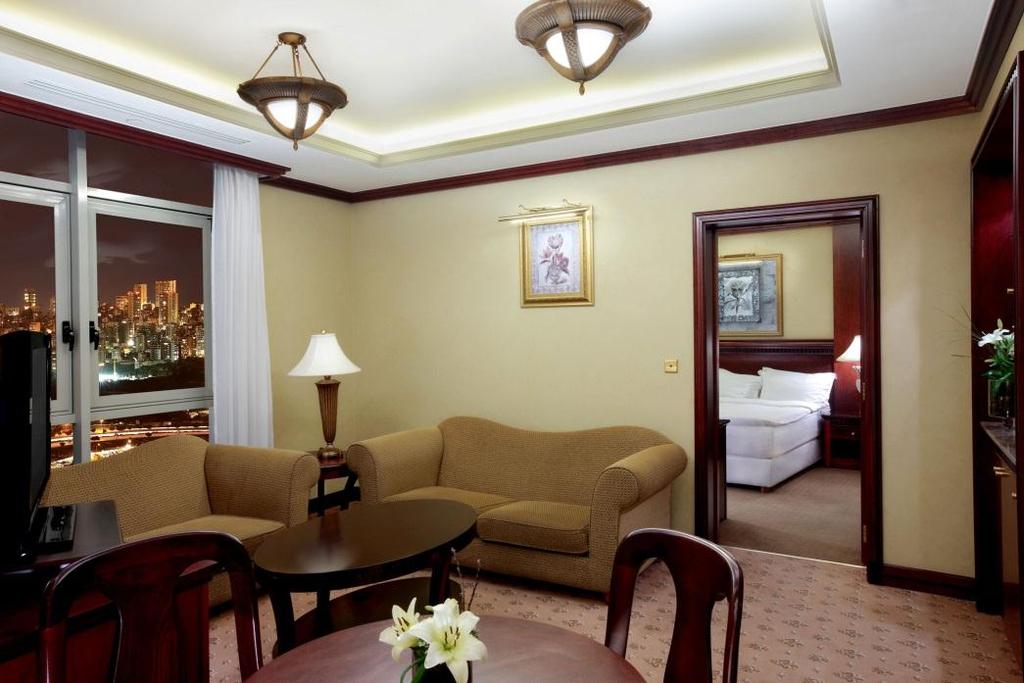 ACCOMMODATION E X E C U T I V E S U I T E Elegantly decorated suites with king-size beds, a jacuzzi bath and a comfortable sitting room, which has two large sofas
