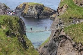 The rope bridge originally consisted of a single rope hand rail which has been replaced by a two hand railed bridge by the National Trust.
