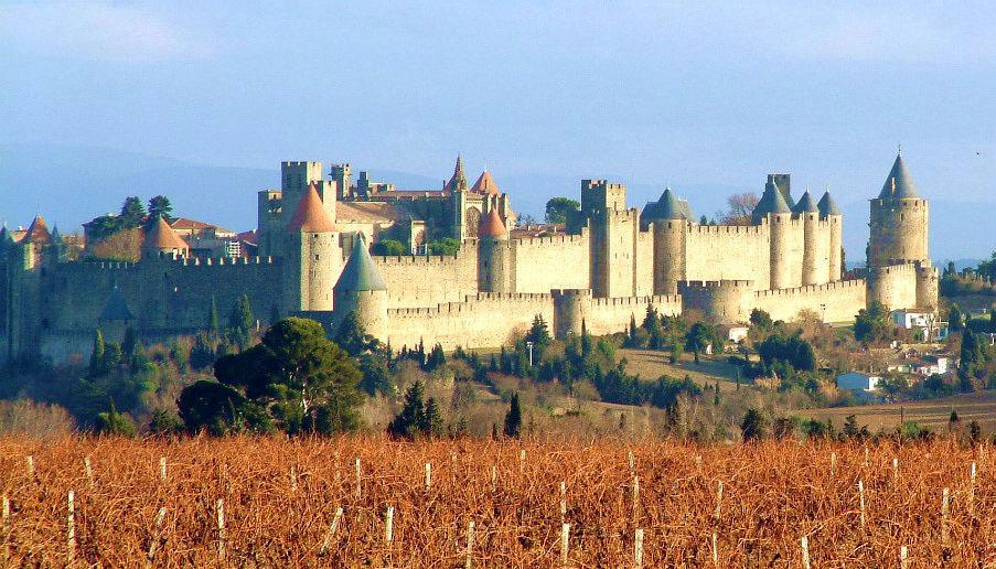 Wednesday, May 14 Travel (398 kms/247 miles) from Barcelona to Toulouse, France with a stop in the walled city of Carcassonne Depart Barcelona, crossing into France.