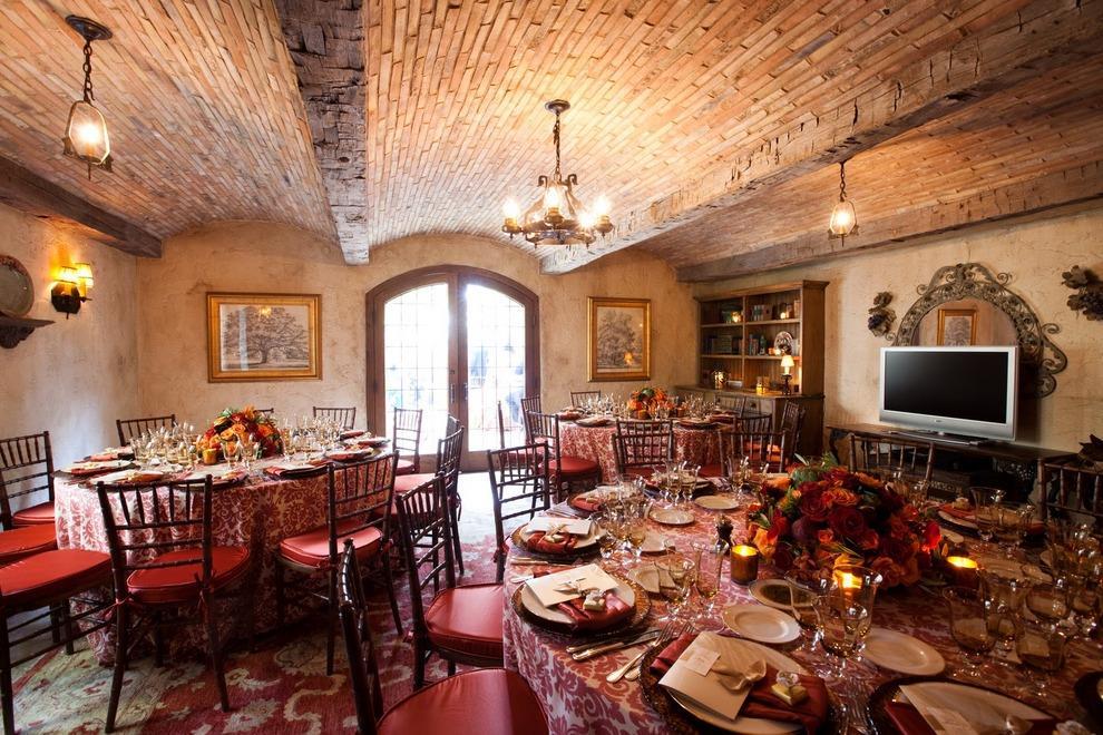 and a separate dining room with crackling fireplace and