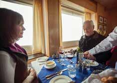 EARLY AFTERNOON Back on the ship, sip a welcome hot beverage before shrugging off your expedition parka and settling down for a casual, convivial lunch.