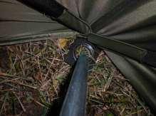 On windy days, secure the outside of the tent by tying one of the tie strings on each of the