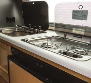 White Counter Tops Yacht-Styled Flooring Dinette Glass Top Sink & Stove Features: Polished Aluminum Sidewalls