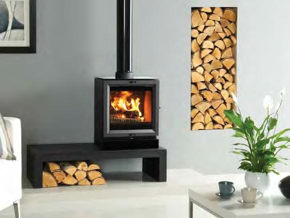 view STOVE New models improve the View View 5 woodburning with Optional Glass Top Plate on Riva 100 High Bench, shown with Gloss Black Flue Pipe.