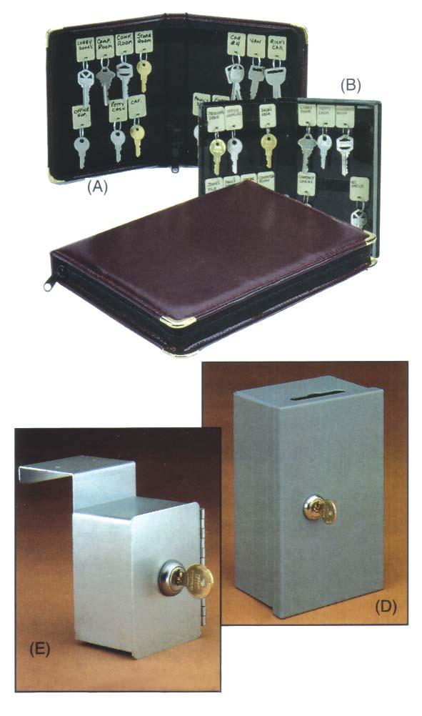 Key cases and boxes A - PORTABLE ZIPPERED KEY CASES Attractive burgundy leather-like vinyl case has brass corners and looks like a portfolio. Easy-slide zipper keeps keys enclosed.