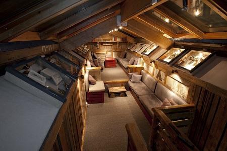 ACCOMMODATION LONGYEARBYEN BASECAMP HOTEL Built using reclaimed driftwood, the rustic and charming Basecamp Hotel (also known as Trappers Lodge) is furnished throughout with Arctic bric-a-brac and