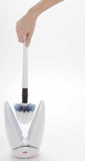 Compact Toilet Brush Canister door springs open when Brush is lifted and closes when