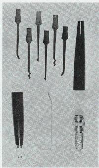 The picture in Figure 28 shows a set of commercially available double sided picks. Technically, these are a combination of a rake, a rocker pick and a try out key.