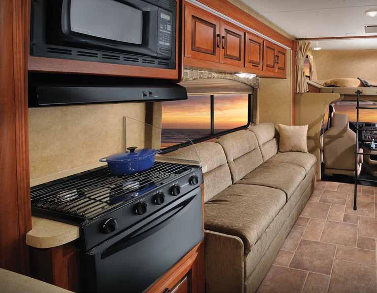 All Sunseeker floor plans offer an optional entertainment center with a 32 TV in the overhead bunk area. 3170DS KHAKI WITH CHERRY WOOD Sunseeker Features 4 A. / B. / C. KIDS ZONE.