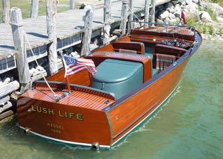 professionally-restored late 1940's 25' Chris-Craft Sportsmans. The Les Cheneaux Golf Club has provided a gift certificate for four 9hole rounds of golf.