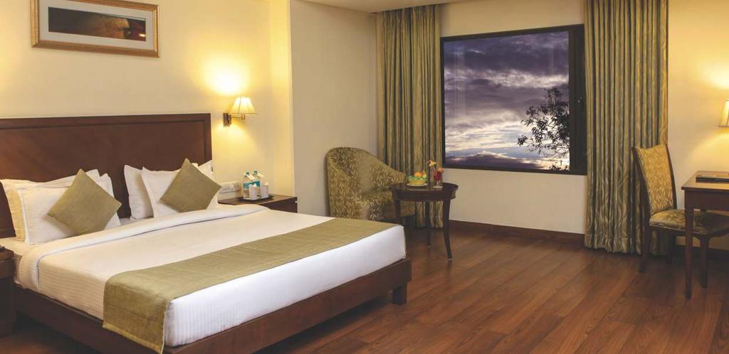 NEW OPENINGS View of the Premium Room at LeLac Sarovar Portico, Ranchi - Jharkhand The Muse Sarovar Portico, Kapashera - New Delhi 73 Guest Rooms & Suites All Day Dining Banquet & Conferencing