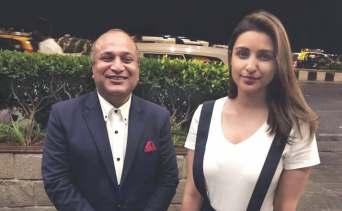 com Bollywood actress Parineeti Chopra with Parvez Sheikh, F&B Manager during her recent visit at Hotel Marine Plaza, Mumbai.