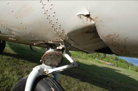 were broken when the nose landing gear sank into swampy ground outside the runway hard
