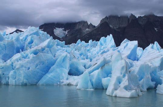 526 CHAPTER 19 GLACIAL SYSTEMS AND LANDFORMS GEOGRAPHY S PHYSICAL SCIENCE PERSPECTIVE Glacial Ice Is Blue! W hen we make ice in our freezers, clear colorless water turns to relatively clear ice cubes.