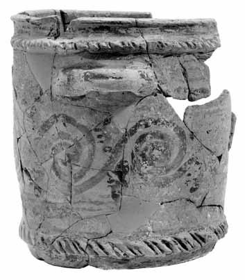 Fig. 17. Vases from the Central Hall XXII. Drawings and photo of no. XXII.A9. PIT.XXII.A1 PIT.XXII.A6 : 13 cm. : 12 cm. PIT.XXII.A9 PIT.XXII.A5 2 0 1 cm.