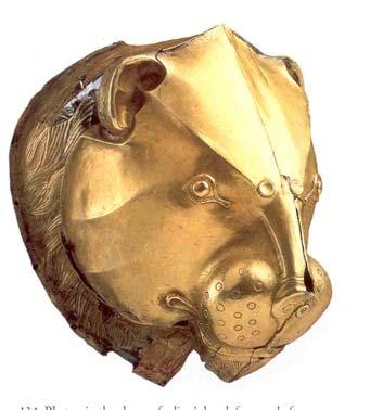Some of these pieces, such as the magnificent gold vessel in the shape of a lion's head (fig.