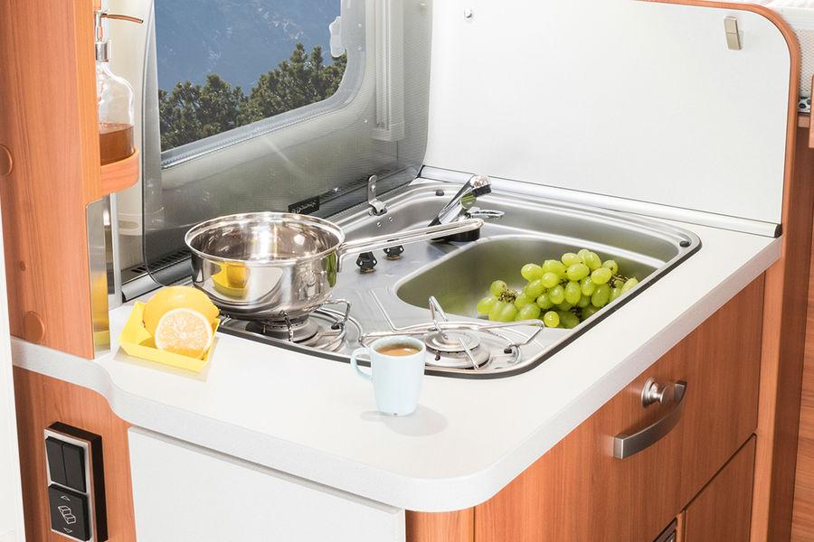 Well-equipped compact kitchen The modern kitchen in the HYMER Van S standard