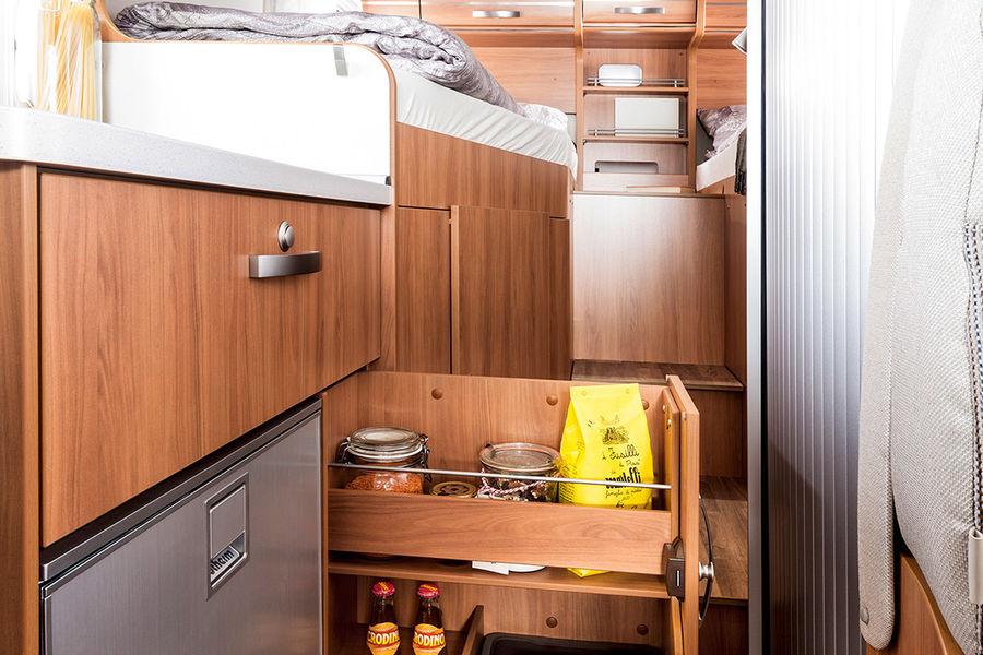 Handy pull-out cupboard The kitchen unit of the HYMER Van S has a handy pull-out cupboard for easy access.