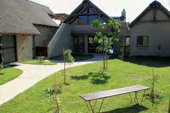 Lodge Facilities A courtyard walkway leads to the spacious open plan lounge, dining room and