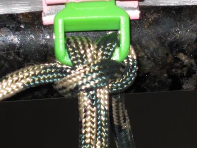 first knot. Measure the center strands to ensure the length from buckle to buckle at the strap bar is equal to the wrist measurement (Figure 4.14).
