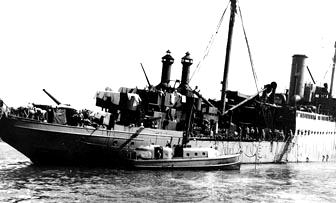 The force of that massive blast knocked the VESTAL's 3-inch gun crew overboard; including her commanding officer, Cassin Young.