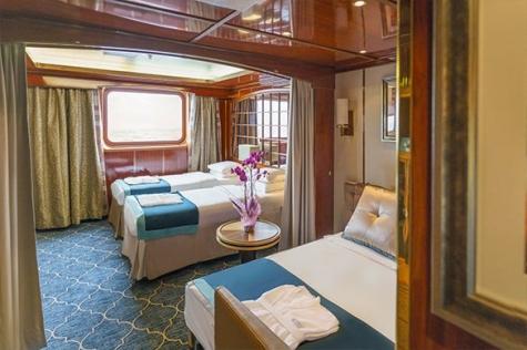 Triple Classic Passengers: 3 Size: 21 M² (226 FT²) View: picture window Averaging 21 square metres/226 square feet, these staterooms have two twins and a comfortable sofa bed.