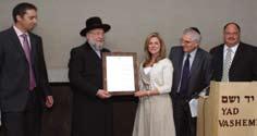 Member of the Board of Trustees Hannah Loftus (center) and Chairman of the Board Brian Markeson (second from right) were presented with a certificate by Chairman of the Yad Vashem Council Rabbi