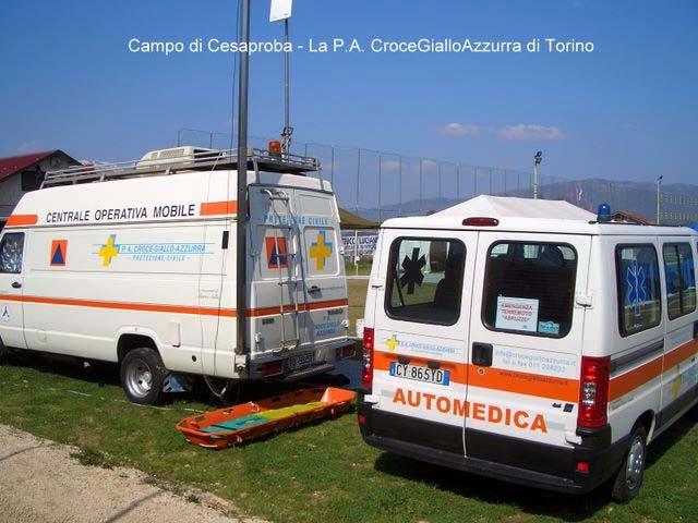 Cesaproba Camp: Mobile ops centre and ambulance of the Yellow-Blue Cross (a