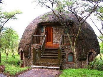 Safari Lodge (Central Serengeti) Drawing its inspiration from the circular 'Rondavel' dwellings