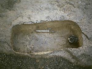 pit grave: Simple rectangular pit dug into the earth or bedrock Cremation burials are divided into: primary, when the body is