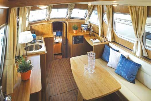 Large saloon/ Galley with convertible dinette