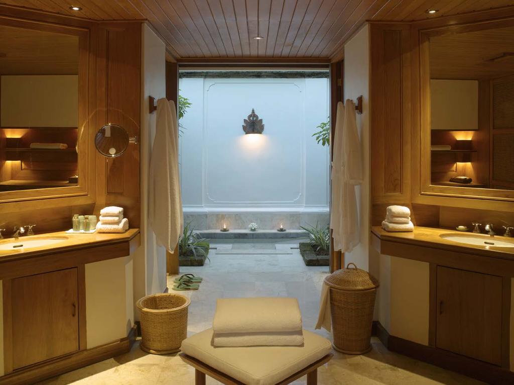 Suites enjoy a large sunken marble bath in an