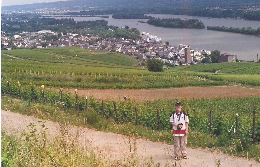 Jimmy walking through vineyard Rudesheim on Rhine We then went back over the Rhine to Castle Rheinstein where we had to park on River Road and climb a steep hill to the 9 th Century castle.